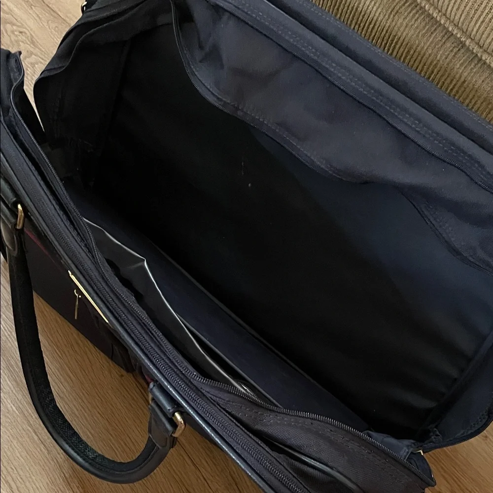 American Tourister Black Briefcase with Red Accents